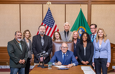 Washington State Governor signing into law the Social Work Licensure Compact638508213141739386